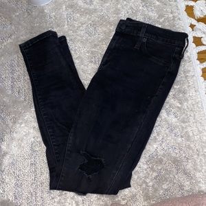 Black distressed skinny jeans